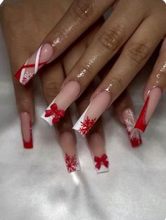 A festive nail design showcases vibrant red and white accents, complete with bows and snowflakes. The playful details capture the holiday spirit perfectly. Elevate your holiday spirit with our festive Christmas nails collection, featuring short press-on nails that are perfect for celebrating in style. Our use of nail wraps and stickers allow for endless creativity, making them an ideal addition to your self-care box or care package for her. Whether you're looking for a thoughtful 8th anniversary gift or a unique Scorpio gift, these stylish nail accessories are sure to impress. They also make a delightful surprise for a 16th birthday gift or as a special treat in an advent calendar gift. With our short square nails, getting ready for the holidays has never been easier or more fun. Treat you Christmas Nail Set, Nail Designs Valentines, Nails Design With Rhinestones, Cute Acrylic Nail Designs, Creative Nail Designs, Snowflake Nails, Long Acrylic, Pink Acrylic, Glam Nails