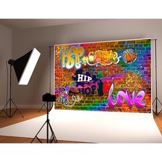 an image of a photo studio setting with lights and backdrops in front of it