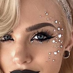 Festival Face Jewels Ideas, Rhinestones Face Makeup, Rhinestones Around Eyes, Gem Liner Makeup, Silver Glitter Makeup Festival, Face Gems Makeup Festival, Bejeweled Face Makeup, Rhinestone Mask Makeup