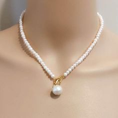 Item No: NK642Item: freshwater pearl necklaceShape: potato shapeSize: 4-5mm and 11-13mmColor: whiteLuster: goodSkin: with flawsQuality: Aclasp :silver 925 with white gold plated or yellow gold platedHand Knotted: NONecklace length: any length can make,Packing: beautiful gift pouch,ready for gift givingPlease contact Lisha freely if you have any specific demand or need custom order,I will always try my best to meet your request. Classic Pearl Necklace With Toggle Clasp As Gift, White Pearl Toggle Necklace With Pearl Pendant, White Pearl Toggle Necklace With Pearl Charm, White Pearl Necklace With Toggle Clasp, Handmade White Pearl Necklace In 14k Gold-filled, White Pearl Necklace With 14k Gold-filled Pearl Pendant, Pearl Lariat Necklace, Pearl Lariat, Pearl Accessories