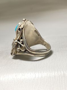 "Turquoise ring coral Navajo southwest sterling silver women men Size 11.50 Weight 11g Length. 1. 1/4 \" Thinnest part of band. 3/16\" Free Shipping & Free Postal Insurance Delivered in a Gift Box If you do not want the ring polished and want to leave the natural patina please let me know at the time of purchase as I do polish rings before I ship rings out. Thanks USPS Domestic Shipping is free for buyers. If a buyer prefers to upgrade to priority, the buyer will pay that portion of the ship Southwestern Silver Turquoise Open Ring, Southwestern Style Silver Turquoise Open Ring, Southwestern Style Silver Open Turquoise Ring, Southwestern Open Turquoise Ring, Southwestern Sterling Silver Opal Ring, Vintage Blue Concho Ring, Southwestern Silver Turquoise Ring With Concho, Western Silver Turquoise Ring Stamped 925, Untreated Silver Turquoise Ring In Southwestern Style