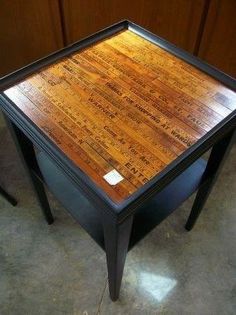 a wooden table with writing on it