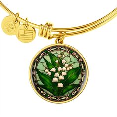 "Embrace the delicate beauty of the Lily of the Valley with our exquisite Personalized 18K Gold Charm Pendant Lily of the Valley Bracelet. This perfect birth flower jewelry gift celebrates the month of May in all its splendor. Crafted with precision and personalized with care, this bracelet serves as a meaningful keepsake for those born in May or anyone who appreciates the enchanting allure of this timeless flower. Adorn yourself or someone special with this elegant and sentimental piece, captur Yellow Gold Flower Jewelry For May Birthstone, Flower Charm Jewelry For May Birthstone, Flower Jewelry With May Birthstone Charm, May Birthstone Jewelry With Flower Charm, Flower-shaped Jewelry With Flower Charm For May Birthstone, Green Bracelet With Flower Charm As Gift, Gold Flower-shaped May Birthstone Jewelry, Mother's Day Green Flower Jewelry, Gold Flower Necklace For May Birthstone