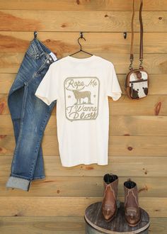 Rope Me Tee-Graphic Tee-Crooked Horn Company, Online Women's Fashion Boutique in San Tan Valley, Arizona 85140 Cream T-shirt With Text Print In Relaxed Fit, Cream Cotton T-shirt With Graphic Print, Casual Cream Pre-shrunk Tops, Casual Cream T-shirt, Cream Short Sleeve T-shirt With Text Print, Cream T-shirt With Text Print And Relaxed Fit, Cream Relaxed Fit T-shirt With Text Print, Cream Short Sleeve T-shirt With Letter Print, Cream Cotton T-shirt With Text Print