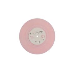 a pink record with writing on it