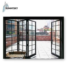 an open window with the words sunny sky on it and a view of a brick building