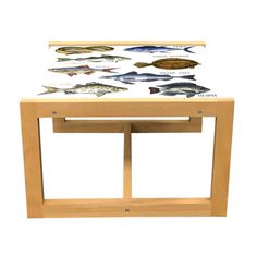 a wooden table with fish on it