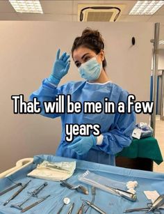 a woman in scrubs and gloves holding up her hand with the words that will be me in a few years