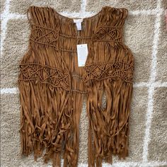 Rusty Tan Suede Like Vest. This Vest Is Brand New With Tags. Cute Detailing Across Two Areas Of The Vest, Fringe Type Bottom. Casual Camel Tops For Spring, Trendy Brown Festival Tops, Trendy Brown Tops For Festival, Trendy Brown Top For Festival, Brown Fringed Tops For Festival, Brown Fringe Tops For Festival, Brown Fringe Top For Festival, Chic Brown Festival Tops, Chic Brown Tops For Festival