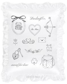 a pillow that has various items on it with the words, sayings and symbols