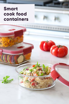 some food containers are sitting on a counter with tomatoes and other foods in them,