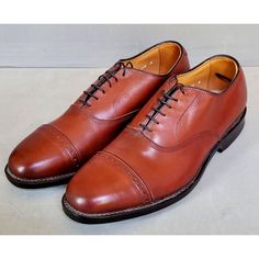 Elevate Your Formal Look With These Allen Edmonds Byron Cap-Toe Oxford Dress Shoes. Crafted With Premium Leather Upper And Lining Material, These Shoes Ensure Durability And Comfort All Day Long. The Lace-Up Closure Provides A Secure Fit, While The Leather Outsole Offers Excellent Traction On Any Surface. These Shoes Come In A Modern Chili Color And A Size 9 Us/Eu. The Cap Toe Design And Oxford Style Add A Touch Of Sophistication To Any Outfit, Making Them Perfect For Any Season. Whether You're Fitted Cap Toe Derby For Semi-formal Occasions, Fitted Goodyear Welted Cap Toe Derby, Fitted Formal Derby With Cap Toe, Formal Fitted Cap Toe Derby, Fitted Oxford Derby Shoes With Almond Toe, Fitted Snip Toe Oxfords For Galas, Fitted Almond Toe Derby Oxford Shoes, Fitted Almond Toe Derby Shoes In Oxford, Fitted Almond Toe Derby Shoes