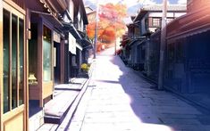 an alley way with buildings and trees in the background