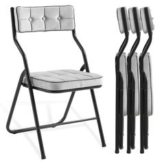 four folding chairs with padded seat covers and black legs, all in different positions on white background