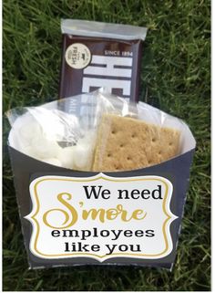 a snack box with crackers, marshmallows and s'more in it