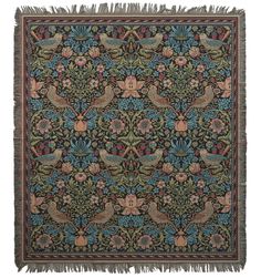 an intricately designed tapestry with birds and flowers in blue, green, pink and orange