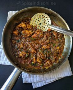 a pan filled with food on top of a table