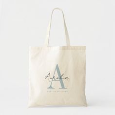 Elegant, stylish tote bag with your custom name and monogram in a trendy hand lettered script calligraphy design in minimalist dusty light blue and black, this typography driven design makes a great gift for coworkers, teachers, coaches, girlfriends, boyfriends, wives, daughters, or any other work or family member! Great for the office, grocery shopping or school this chic tote makes a fun, stylish present for any birthday, wedding or holiday! Extra line of personalized text you can use to make Gift For Coworkers, Minimalist Tote Bag, Bachelorette Party Supplies, Dusty Sage, Script Calligraphy, Stylish Tote Bag, Pink Tote Bags, Bachelorette Party Decorations, Calligraphy Design