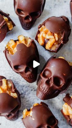 chocolate skulls with nuts in them on a table