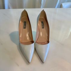 One Of Our Classic, Pointed-Toe Pumps (And Sjp's Personal Favorite). Rampling's Cut On The Front Of Your Foot Is Both Sexy And Flattering, And Also Very Forgiving For Those With Slightly Wider Feet. All Sjp By Sarah Jessica Parker Shoes Are Proudly Made In Italy By Third And Fourth Generation Tuscan Shoemakers. From The Names Of Each Shoe To The Signature Grosgrain Detail Found On Each Product, Every Style Offers A Story As Personal To The Wearer As It Is To Sarah Jessica. Made In Italy Heel Hei Sjp Shoes Sjp By Sarah Jessica Parker, Sarah Jessica Parker Shoes, Sjp Shoes, Size 11 Heels, Sarah Jessica, Sarah Jessica Parker, Shoes Women Heels, Leather Upper, Heel Height