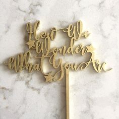 there is a cake topper that says hey, we're wonderful what you are