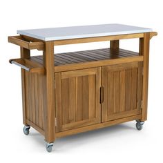 a wooden kitchen island on wheels with a white top