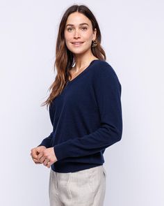 Our Essential V Neck sweater, made from 100% pure, sustainably sourced cashmere, blends ethical fashion with timeless style. Its V-neckline is artfully crafted, offering a tasteful depth that elegantly frames the collarbone area while maintaining a balanced aesthetic. This sophisticated sweater is designed to define your waist, with a slightly elongated length suitable for various styles and occasions. Its fine cashmere gauge offers versatility, ideal for a polished look with trousers and a belt Cashmere Fine Knit V-neck Sweater For Layering, Elegant Cashmere V-neck Fine Knit Sweater, Versatile Fine Knit V-neck Sweater, Versatile V-neck Fine Knit Sweater, Cashmere V-neck Sweater For Fall, Fall Cashmere V-neck Sweater, Elegant Cashmere V-neck Sweater, Cashmere V-neck Sweater, Balanced Aesthetic