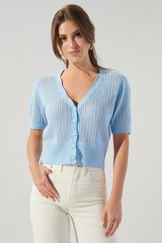 Coast to coast. This cute little cardi is the perfect cover up for those cool mornings and brisk evenings. It features a functional button front with a scalloped edge. A ribbed sweep balances off the top, making it ideal for layering over tanks and pairing with cutoffs or cropped wide leg denim.- Crochet knit- Button front- Scallop edge- Ribbed sweep- Comes in 2 colorsSize + Fit - Model is 5'8" and wearing size XS- Measurements taken from size S - Chest: 34"- Length: 19" Fabric Self: 100% Cotton Pastel Shorts, Puff Sleeve Cardigan, Knit Cardi, Sleeve Crochet, Summer Cardigan, Organic Cotton Yarn, Coast To Coast, White Cardigan, Wide Leg Denim