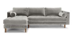 a gray couch and ottoman on a white background