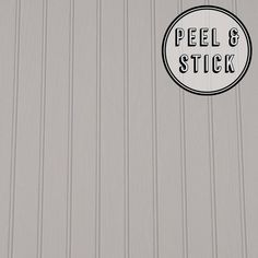 a sticker on the side of a building that says peel & stick in black and white