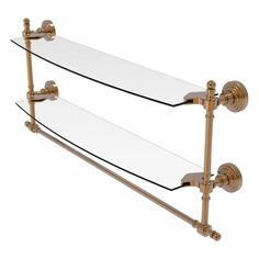 two glass shelves with gold fixtures on each side and one shelf for the toilet paper