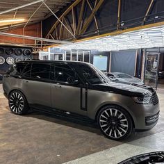 a range rover is parked in a garage