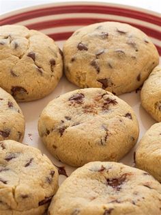 chocolate chip cookies on a red and white plate