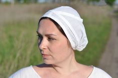 Historically accurate women's linen St. Birgittas cap or coif for reenactors in the medieval style, 13th - 15th century. Made to order. This small white linen coif without embroidery is called St. Birgitta's huva. It is the most basic historical element of women's medieval headdress. The coif is split into two pieces which are sewn together with a seam. The bottom edge is gathered into the binding strip that runs across the front edge and then continued on as the ties that help to secure the cap Medieval Headdress, 13th Century Clothing, Medieval Headwear, Medieval Garb, Invisible Stitch, Medieval Style, Century Clothing, Medieval Clothing, Linens And Lace