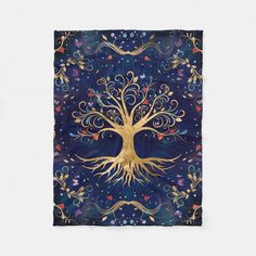 a blue and gold square scarf with a tree on it