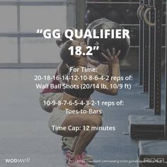 a woman squats on the ground while holding a medicine ball in front of her