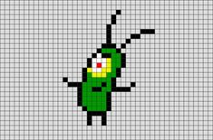 an image of a pixel style character in green and yellow