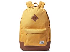 Herschel Supply Co. Heritage - Backpack Bags : Harvest Gold 1 : Limited lifetime warranty. Do you know your roots? The Herschel Supply Co. Heritage backpack certainly does. With a signature shape and feel, this sleek pack will help define your style for years to come. School backpack in a durable polyester with a spacious main compartment can hold books, clothes, or other daily essentials. Interior sleeve pocket can hold up to a 15 laptop. Additional front compartment with a key clip. Internal m Classic Bags For Back To School, Classic Nylon Backpack For Back To School, Classic School Backpack In Nylon, Classic Nylon School Backpack, Classic School Nylon Backpack, Heritage School, Define Your Style, Harvest Gold, Heritage Backpack