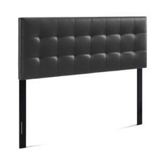 an upholstered headboard with black metal legs and buttons on the top, in front of a white background