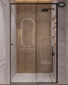 a bathroom with a walk in shower next to a wall mounted toilet paper dispenser