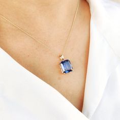 This stunning pendant is set in 14K Solid Yellow Gold studded with Blue Sapphire Hydro in classic prong setting. It is an unique gemstone pendant for nearly every occasion and is completely hassle-free jewelry. ◾ITEM DETAILS * Gem: Blue Sapphire Hydro * Gem Size: 10X12mm * Gem Shape: Octagon * Gem Weight: 8.50 carats * Gold Purity: 14KT  * Gold Weight: 0.97gram * Total Weight of the Pendant: 2.69 gram The Gold purity is guaranteed and it comes with authentic 14KT gold hallmark. Since my items ar Blue Rectangular Pendant Jewelry For Formal Occasions, Blue Tanzanite Jewelry Perfect As A Gift, Blue Tanzanite Jewelry As A Gift, Sapphire Tanzanite Jewelry Gift, Blue Rectangular Pendant Fine Jewelry, Blue Gemstone Jewelry With Rectangular Pendant, Sapphire Rectangular Pendant Jewelry For Gift, Blue Rectangular Pendant Jewelry For Anniversary, Blue Emerald Cut Necklace Fine Jewelry