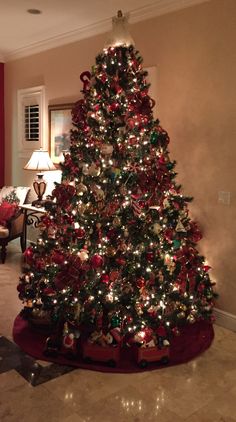 a decorated christmas tree in a living room