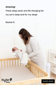 a woman holding a baby in her crib with the caption saying, amazing these sleeps are life changing for my son's sleep and for my sleeping