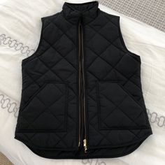 J. Crew Factory Nwot Black Sleeveless Quilted Puffer Vest In Excellent Condition- No Flaws. This Quilted Style Is On-Trend Now. Zip Front, And Two Front Pockets With Hidden Snap Close. 100% Polyester. Machine Washable. Non-Smoking Home And Fast Shipper. Black Winter Vest, Black Quilted Vest, Vest Womens, Quilted Puffer Vest, Quilted Vest, Black Quilt, J Crew Factory, Puffer Vest, Black Sleeveless