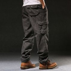 Multi Pockets Casual Cargo Pants provide practicality and style with their multiple pockets and relaxed fit. Ideal for everyday wear, these pants combine functionality and comfort for a versatile wardrobe staple. Casual Trousers For Men, Beach Dresses Casual, Mens Outwear, Men's Cargo Pants, Casual Cargo Pants, Tactical Pants, Style Cargo, Pants Cotton, Safari Style