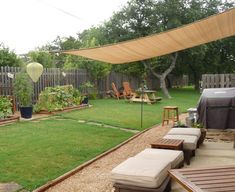 the backyard is clean and ready to be used as an outdoor living space for people