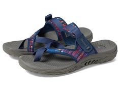 SKECHERS Reggae - Mad Swag - Women's Sandals : Navy : Have some fun with your warm-weather look in the colorful SKECHERS Reggae - Mad Swag sandal. Nylon fabric upper features a woven finish and multi-color textile panel. Slip-on construction. Open-toe silhouette with toe ring detail. Strap over instep with adjustable hook-and-loop closure for a secure fit. Breathable fabric strap lining. Contoured footbed flaunts arch support and toe ridge for added comfort. Flexible rubber traction outsole. Imported. Measurements: Weight: 7 oz Product measurements were taken using size 8, width B - Medium. Please note that measurements may vary by size. Weight of footwear is based on a single item, not a pair. Sketchers Sandals, Swag Women, Skechers Shoes Women, Fabric Strap, Toe Ring, Skechers Women, Nylon Fabric, Skechers Shoes, Toe Rings