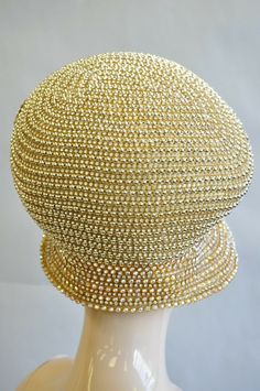 "Item: Shellie McDowell Millinery Gold Beaded Jeweled Gem Ladies Church Derby Crown Hat Maker: Shellie McDowell Details: Hat box included, intricate beaded design, bead and gem alternating pattern Age: Late 20th - Early 21st Century Measurements: Overall: 8\" H x 10\" W x 10\" D Interior band (approximately): 6\" W x 8\" D Condition: Excellent pre-owned condition. Please see all photographs for details Please keep in mind that we offer vintage and pre-owned items that can show normal signs of us Gold Hat With Structured Crown For Evening, Elegant Gold Hats For Ceremonial Use, Elegant Gold Hat For Ceremonial Occasions, Formal Gold Hat With Structured Crown, Elegant Gold Luxury Costume Hats And Headpieces, Luxury Gold Hat For Evening, Adjustable Gold Hat Headpiece, Luxury Gold Hat Headpiece, Crown Hat