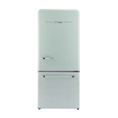 a white refrigerator freezer sitting on top of a white floor next to a wall