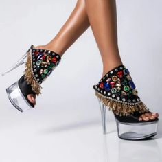 Bring The Heat With The Azalea Wang Put It On Me Chunky Sandal In Mule. This Intricately Embellished Sandal Features A Faux Suede Footband, Open Toe Mule Silhouette, Cushioned Midsole, Clear Perspex Platform Sole, And Coordinating Stiletto Heel. Lavish Rhinestone Accents And Delicate Beaded Fringe Bring This Style To A Sparkling Finish. Accent This Pair With A Textured Mini Dress And Dangly Earrings To Slay The Night Away. Fit And Details Approx. Measured From A Women’s Size 8: - Open Toe - Plat Black Sequined Round Toe Heels, Chic Open Toe Sandals With Sequins, Party Embellished Synthetic Sandals, Embellished High Heel Sandals For Night Out, Glamorous Party Heels With Metal Feet, Glamorous Embellished High Heel Sandals, Embellished Closed Toe Sandals For Party, Sequin Open Toe Sandals For Night Out, Luxury Embellished Synthetic Heels